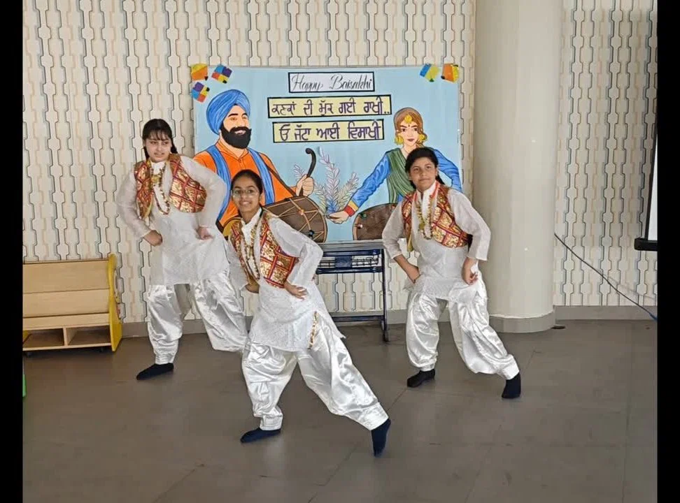 SRGS students performing Bhangra in traditional Punjabi dress