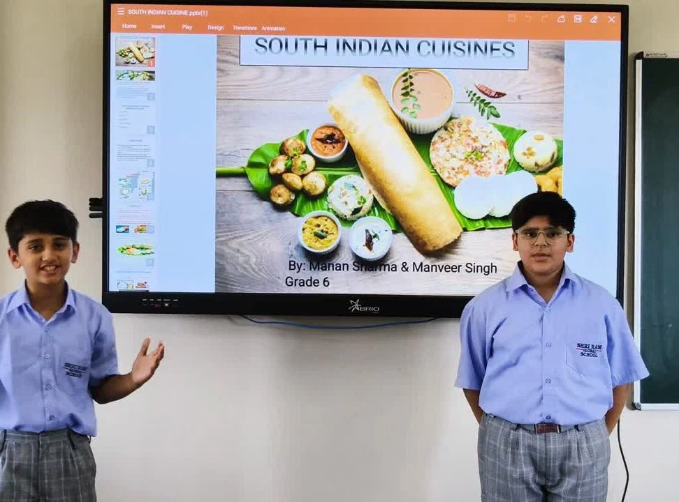 Students presenting South Indian cuisine